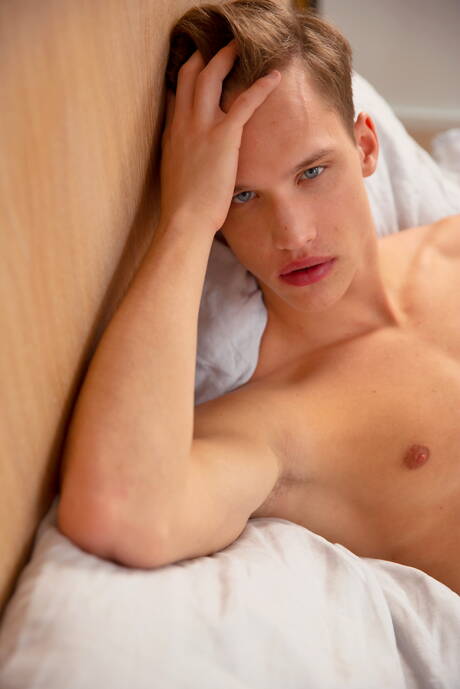 Husky guy Jean Laurent posing nude and showing his butt in shower