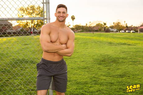 Hunky guy Joey and american young Corey Jakobs sucking and fucking each other outside