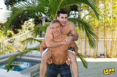 Hunky guy Randy and tough guy Hunter have a hot couple scene at pool