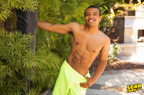 Black hunky guy Ace undressing and showing tight ass in the pool