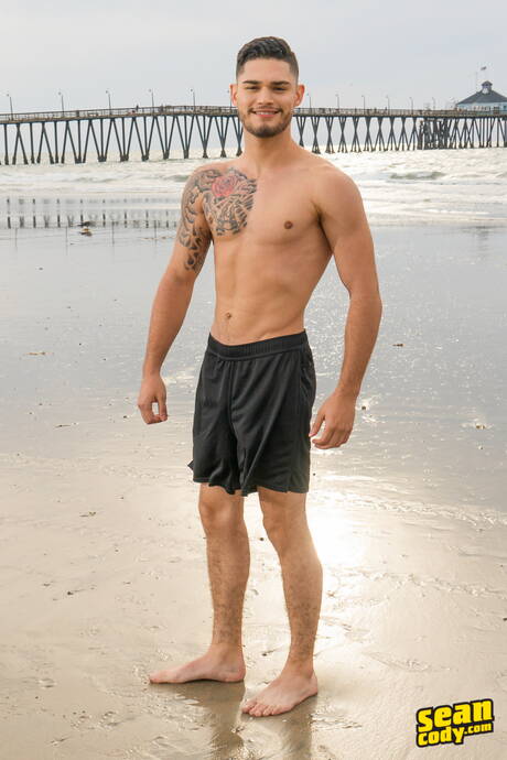 Latvian pretty boy Billy Rubens posing nude and showing tight butt after ocean beach walking