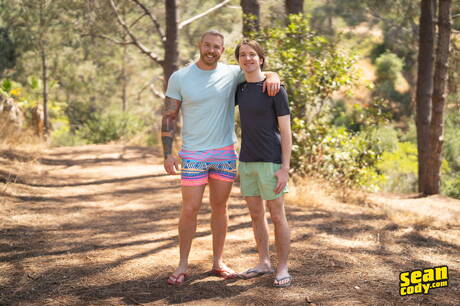 Sean Cody: American strong bull Eddie Burke and well-built David jack off dick outside