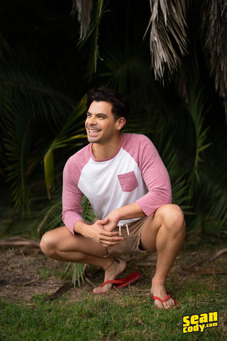 Caucasian muscular Olaf Mortensen posing naked and showing his ass outside