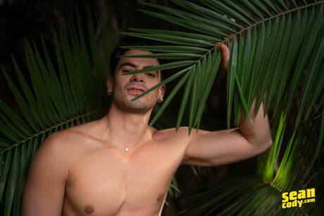 Caucasian muscular Olaf Mortensen posing naked and showing his ass outside