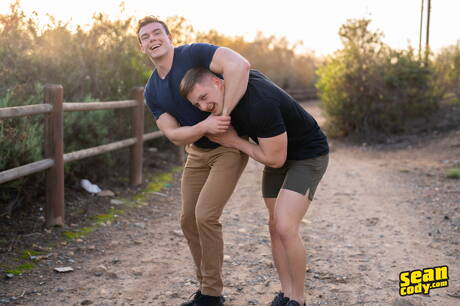 American muscular Clark Reid and strongman Kyle Denton fuck ass after sucking outdoor