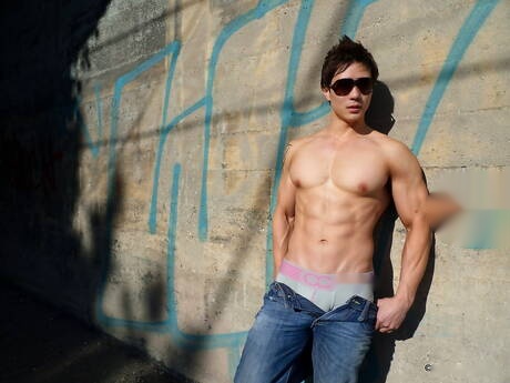 Oriental muscular Peter Le shows a sturdy body outdoor