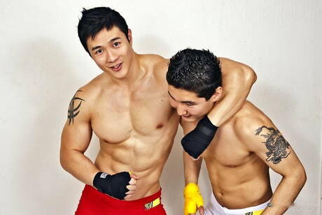 Stud Jake West and oriental bull Peter Le posing naked and showing tight butt