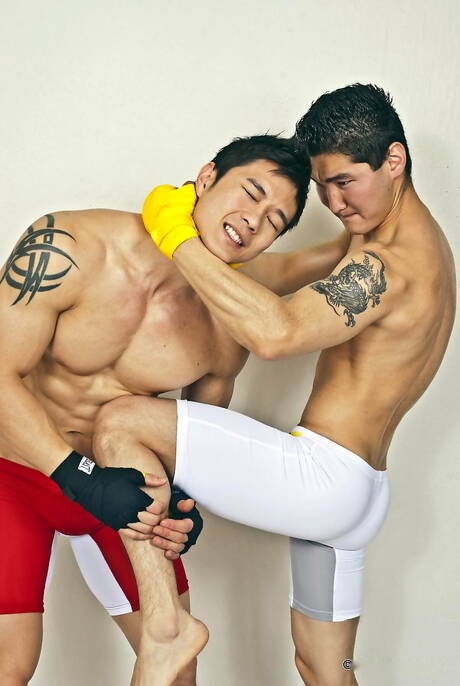 Stud Jake West and oriental bull Peter Le posing naked and showing tight butt