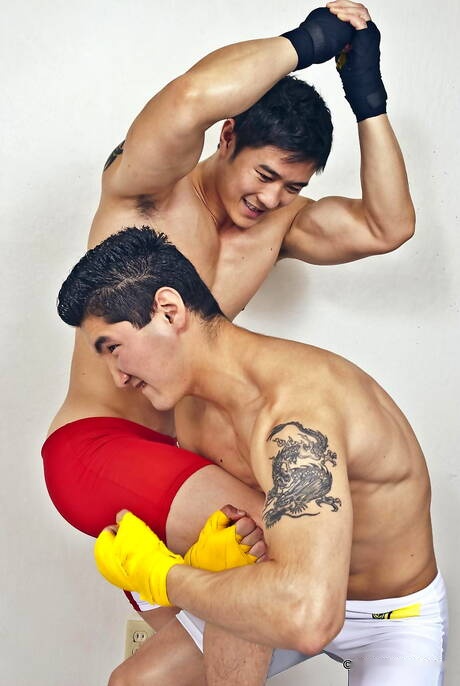 Stud Jake West and oriental bull Peter Le posing naked and showing tight butt