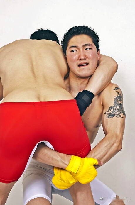 Stud Jake West and oriental bull Peter Le posing naked and showing tight butt