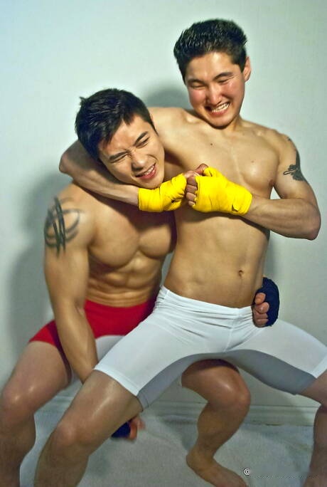 Stud Jake West and oriental bull Peter Le posing naked and showing tight butt