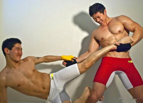 Stud Jake West and oriental bull Peter Le posing naked and showing tight butt