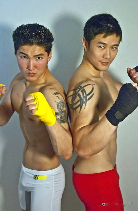 Stud Jake West and oriental bull Peter Le posing naked and showing tight butt