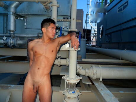 Asian strong bull Eric East posing naked outdoor