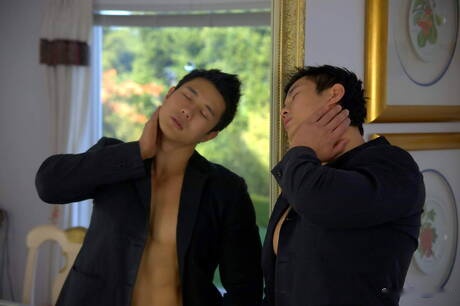 Asian bodybuilder Peter Le shows a perfect body