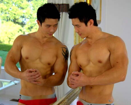 Asian bodybuilder Peter Le shows a perfect body