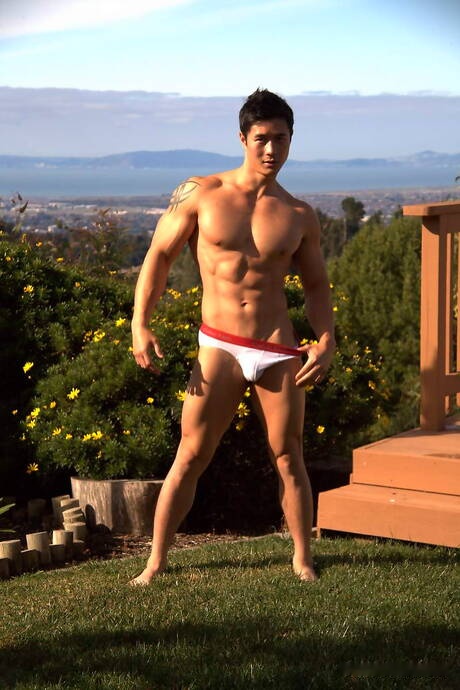 Oriental strong bull Peter Le get naked and showing nice butt outdoor