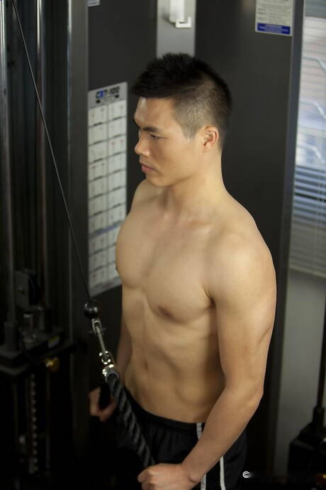 Asian beefy Ben undressing and showing tight butt