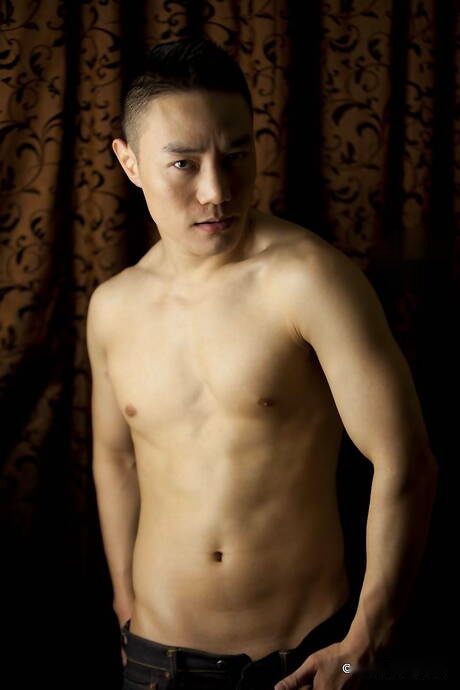 Oriental stud Andy Stroker get naked and showing nice butt