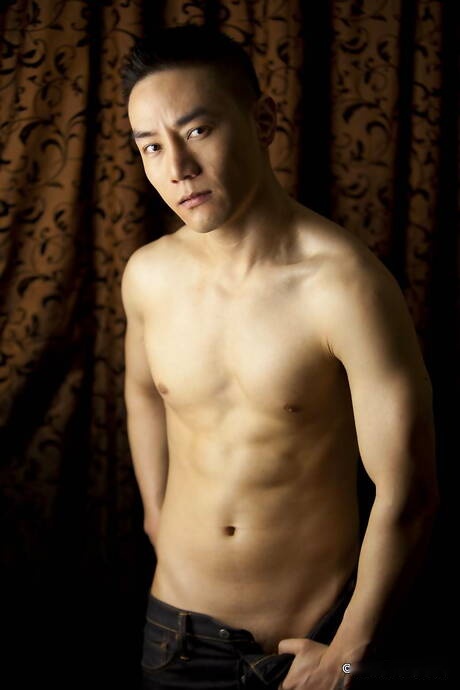 Oriental stud Andy Stroker get naked and showing nice butt