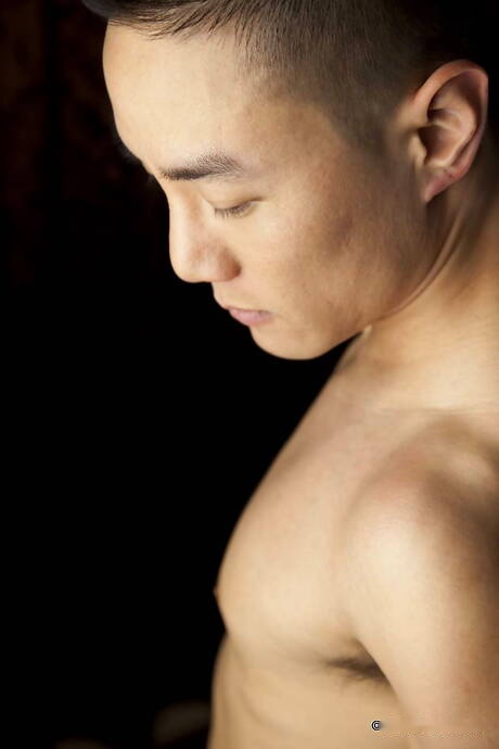 Oriental stud Andy Stroker get naked and showing nice butt