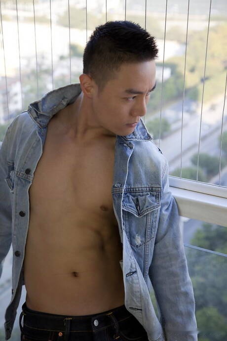 Asian well-built Andy Stroker shows a perfect body