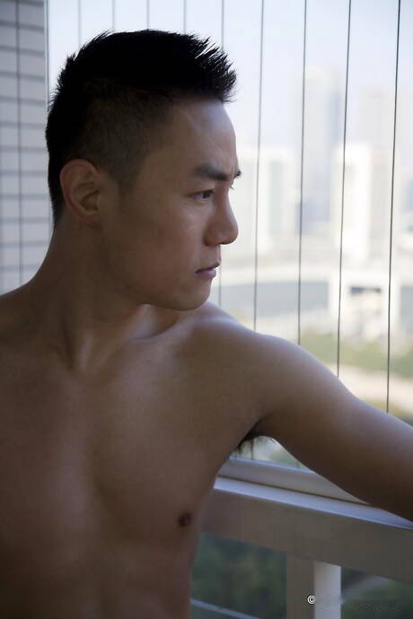 Asian well-built Andy Stroker shows a perfect body