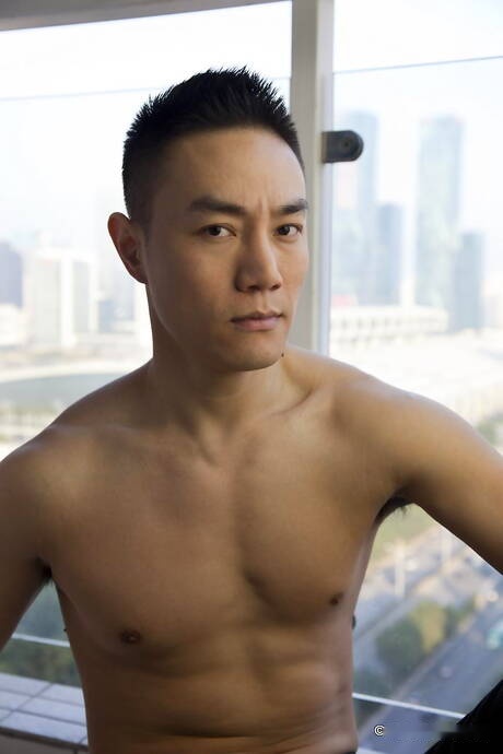 Asian well-built Andy Stroker shows a perfect body