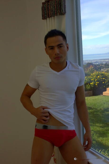 Oriental tough guy Jethro undressing and showing his ass