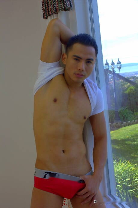 Oriental tough guy Jethro undressing and showing his ass