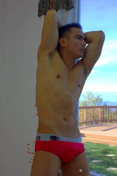 Oriental tough guy Jethro undressing and showing his ass