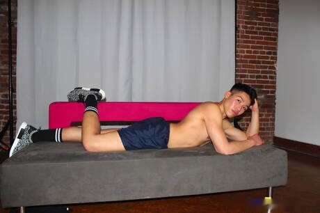 Oriental beefy Dylan Art Nguyen posing naked and showing tight ass