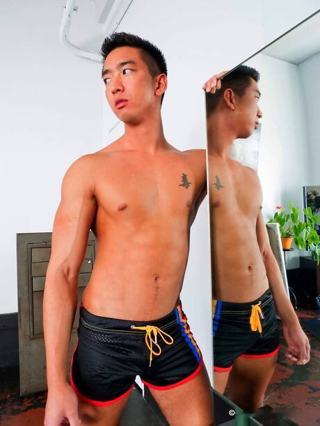 Asian superstud Tristan Tran posing naked and showing nice butt