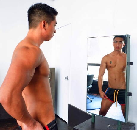 Asian superstud Tristan Tran posing naked and showing nice butt