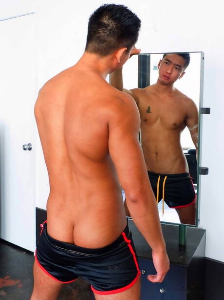 Asian superstud Tristan Tran posing naked and showing nice butt