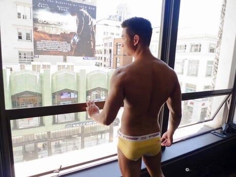 Asian hunk Tristan Tran undressing and showing nice butt