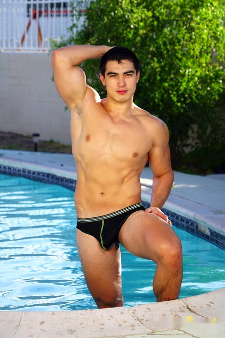 Oriental strong bull Axel Kane undressing and showing hot ass at the pool