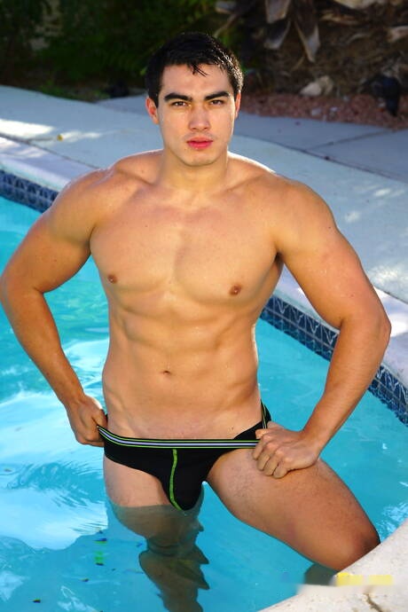 Oriental strong bull Axel Kane undressing and showing hot ass at the pool