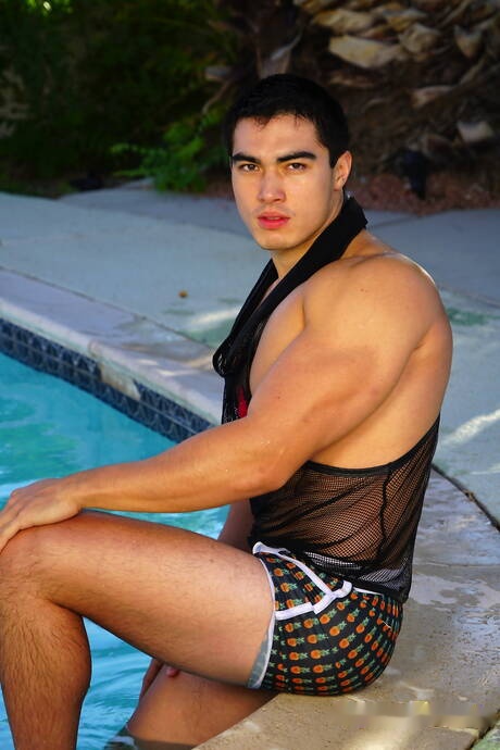 Oriental strong bull Axel Kane undressing and showing hot ass at the pool