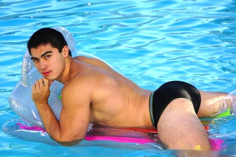 Oriental strong bull Axel Kane undressing and showing hot ass at the pool