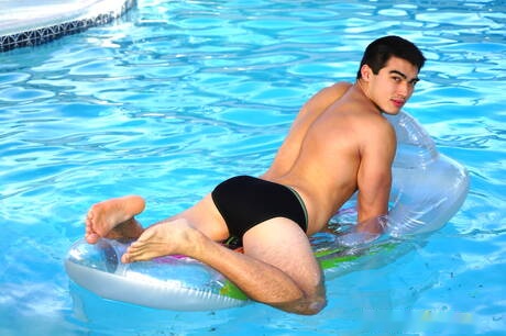 Oriental strong bull Axel Kane undressing and showing hot ass at the pool