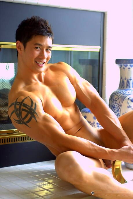 Oriental strong bull Peter Le get naked and showing nice ass in bathroom