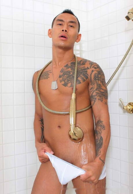 Asian muscular Keni Styles undressing and showing his ass in shower