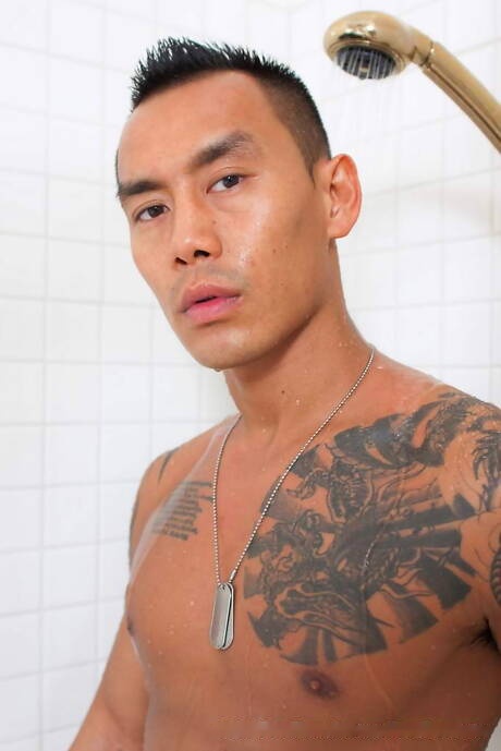 Asian muscular Keni Styles undressing and showing his ass in shower