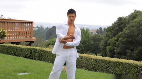 Oriental bull Peter Le undressing and showing tight butt outdoor