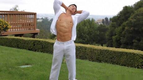 Oriental bull Peter Le undressing and showing tight butt outdoor