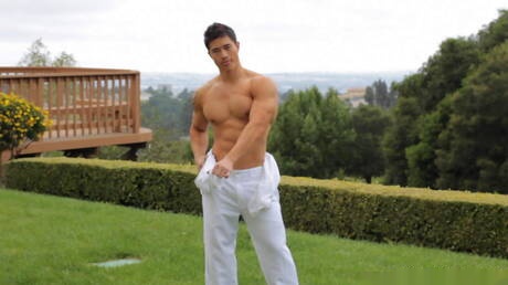 Oriental bull Peter Le undressing and showing tight butt outdoor