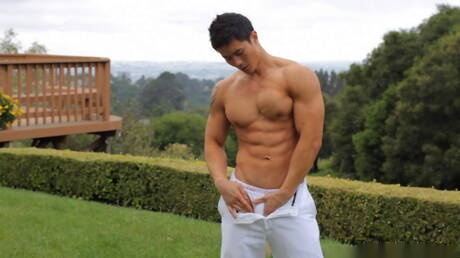 Oriental bull Peter Le undressing and showing tight butt outdoor