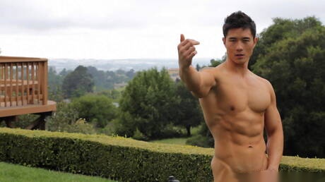 Oriental bull Peter Le undressing and showing tight butt outdoor