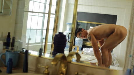 Asian bodybuilder Peter Le masturbating in bathroom